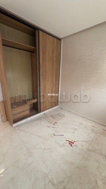 Appartement à l'achat à Al Boustane. 2 pièces. Salon traditionnel et porte blindée - Vente Immobilier - El Jadida - photo 5