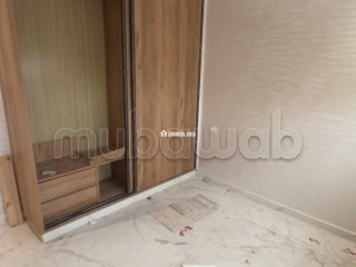 Appartement à l'achat à Al Boustane. 2 pièces. Salon traditionnel et porte blindée - Appartement à vendre - El Jadida