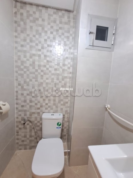 Location d'un appartement en Centre. Surface totale 110 m². Résidence avec concierge - Location Immobilier - Kenitra - photo 6