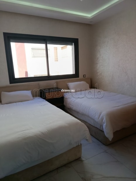 Appartement à louer à Hay Mohammadi. 3 pièces. Bien meublé - Location Immobilier - Agadir - photo 4