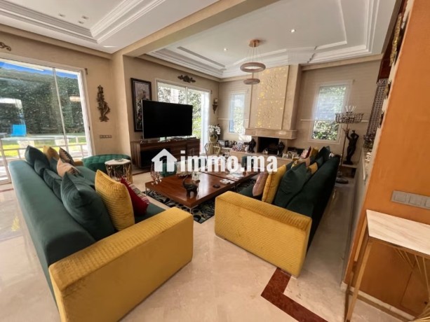 vente-villa-de-luxe-a-ain-diab-extension-5-pieces-confortables-belle-terrasse-et-jardin-big-14