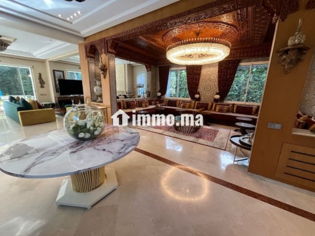 vente-villa-de-luxe-a-ain-diab-extension-5-pieces-confortables-belle-terrasse-et-jardin-big-6