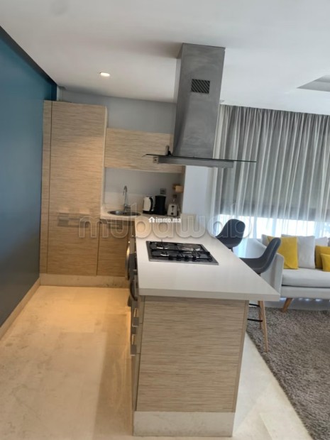 Bel appartement au rez de chaussée en location à Ain Diab Extension.
Surface de 65 m².
Bien meublé - Location Immobilier - Casablanca - photo 3
