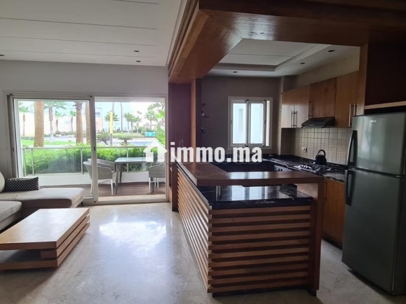 Vend appartement à Dar Bouazza. 1 chambre. Piscine et cheminée - Vente Immobilier - Dar Bouazza - photo 3