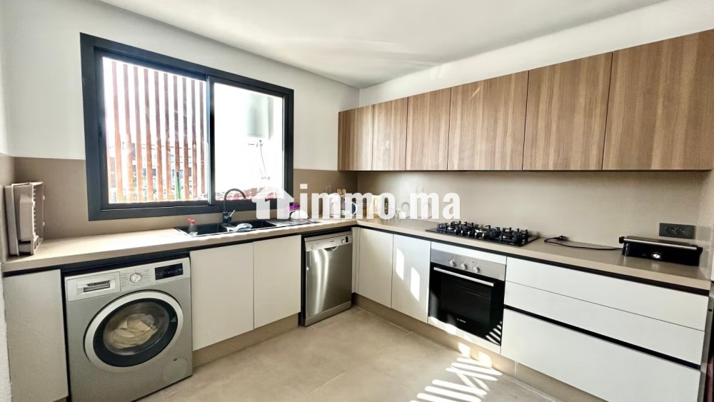 Location d'un appartement à Ain Diab Extension. Surface totale 127 m². TV - Location Immobilier - Casablanca - photo 5