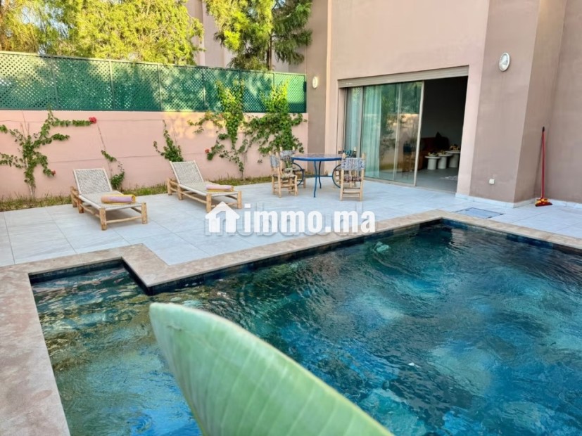 Villa de standing à louer pour vos vacances à Route de Tahanaout.
Surface totale 700 m².
Antenne parabolique et sécurité - Vente Immobilier - Marrakech - photo 6