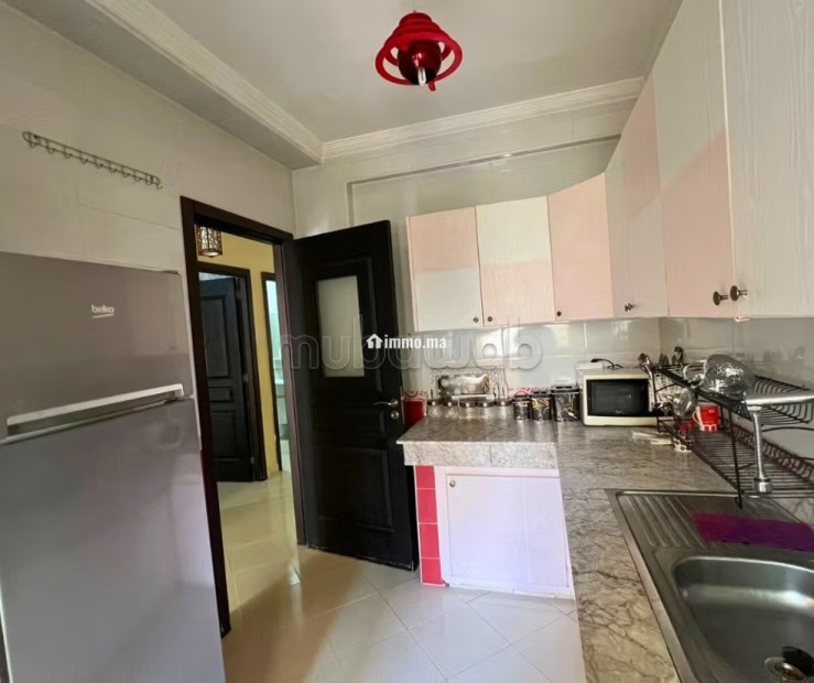 Appartement meublé à louer en plein centre ville - Location Immobilier - Kenitra - photo 7
