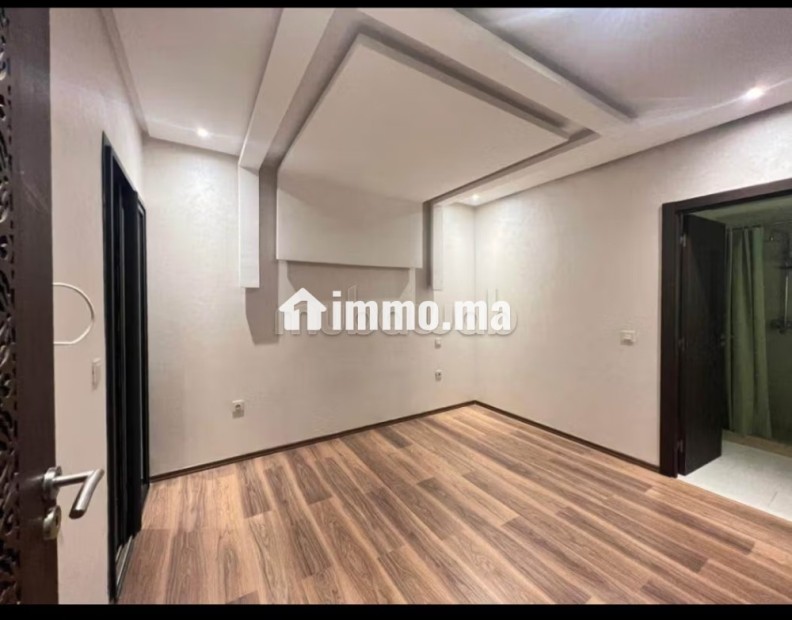 Appartement en location à Hay Mabrouka. 2 belles chambres. Résidence avec concierge, climatisation générale - Location Immobilier - Marrakech - photo 2
