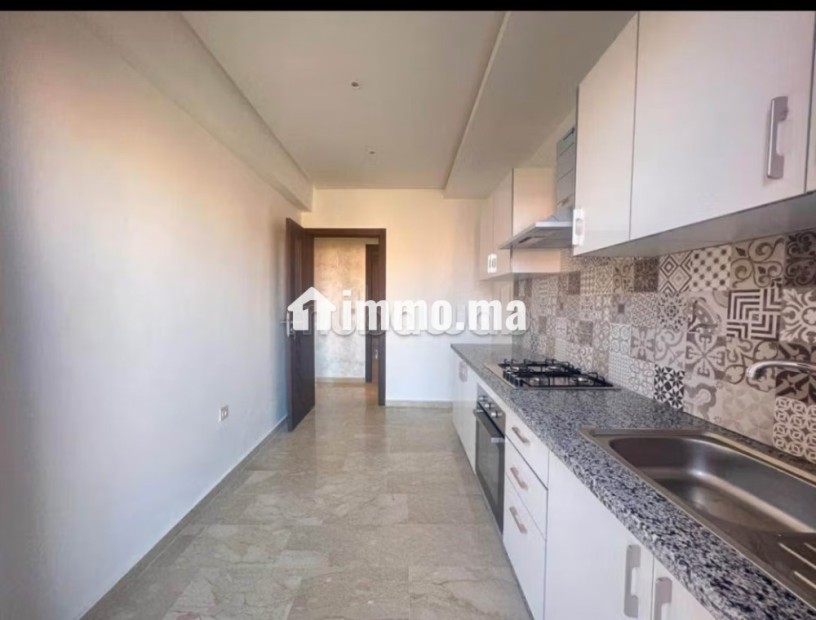 Appartement en location à Hay Mabrouka. 2 belles chambres. Résidence avec concierge, climatisation générale - Location Immobilier - Marrakech - photo 3