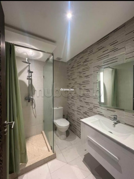 Appartement en location à Hay Mabrouka. 2 belles chambres. Résidence avec concierge, climatisation générale - Location Immobilier - Marrakech - photo 8