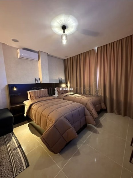 Appartement à louer à Hay Mohammadi. 2 chambres agréables. Salon contemporain - Location Immobilier - Agadir - photo 1
