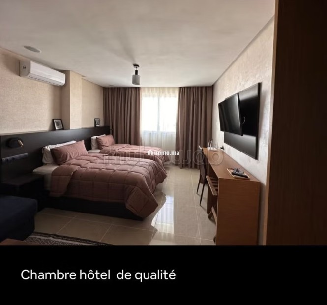 Appartement à louer à Hay Mohammadi. 2 chambres agréables. Salon contemporain - Location Immobilier - Agadir - photo 6