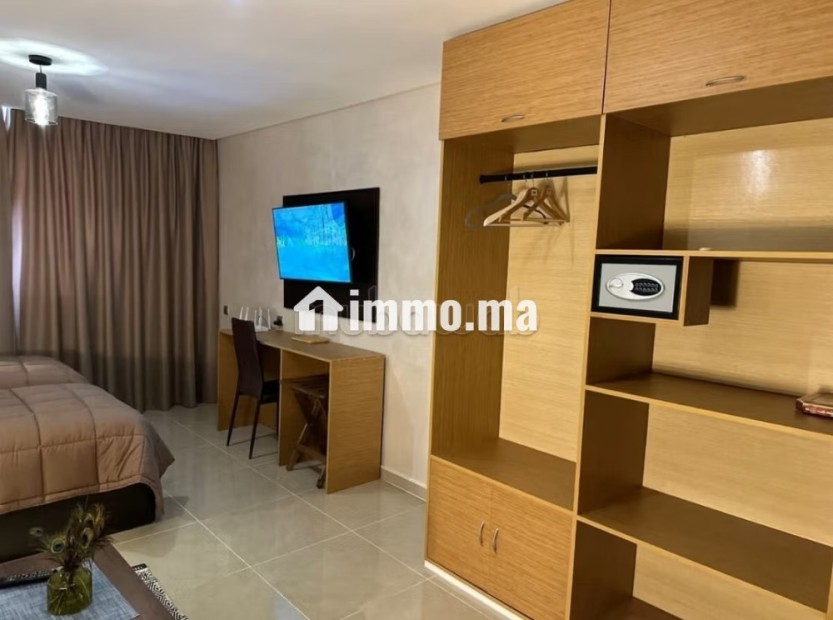 Appartement à louer à Hay Mohammadi. 2 chambres agréables. Salon contemporain - Location Immobilier - Agadir - photo 7