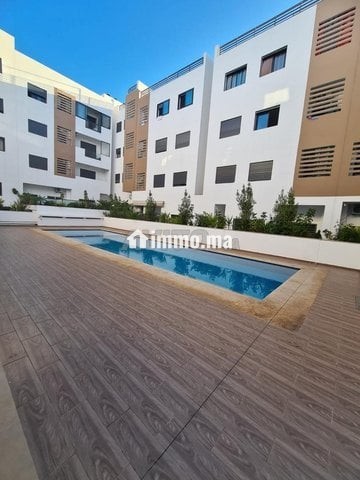 Appartement Neuf À louer Avec Piscine - Location Immobilier - Temara - photo 1