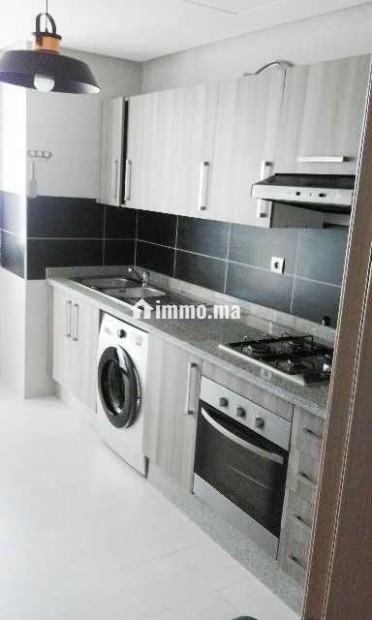 Coquette appartement refaite à neuf à Hassan - Location Immobilier - Rabat - photo 2