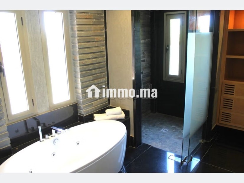 Villa d'exception au cœur de la Palmeraie - Location Immobilier - Marrakech - photo 8