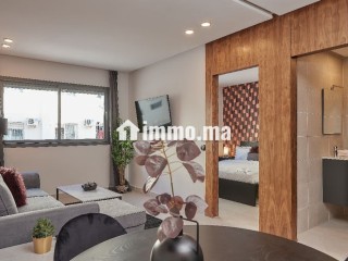 appartement-colore-de-1-chambre-et-salon-parking