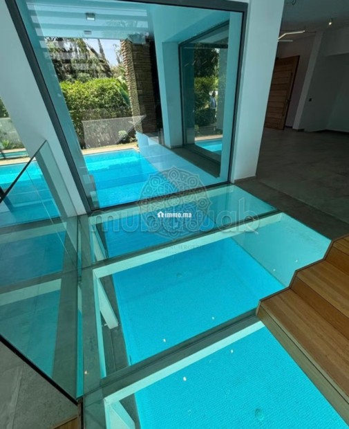Location villa de luxe à Californie.
Superficie 550 m².
Jardin et terrasse - Location Immobilier - Casablanca - photo 4