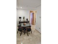 Superbe appartement à louer à Quartier Administratif. 2 chambres agréables. Salon contemporain - miniature 3