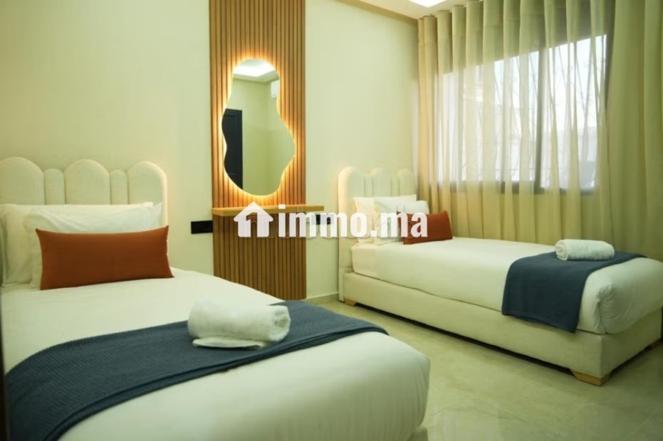 Appartement meuble a louer a bd roudani - Location Immobilier - Casablanca - photo 6