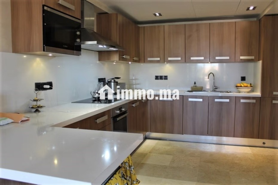 Grand appartement de trois chambres avec terrasse - Location Immobilier - Marrakech - photo 8
