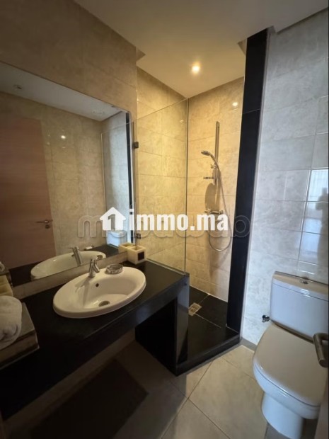 Location d'un superbe appartement, meublé - Location Immobilier - Bouskoura - photo 5