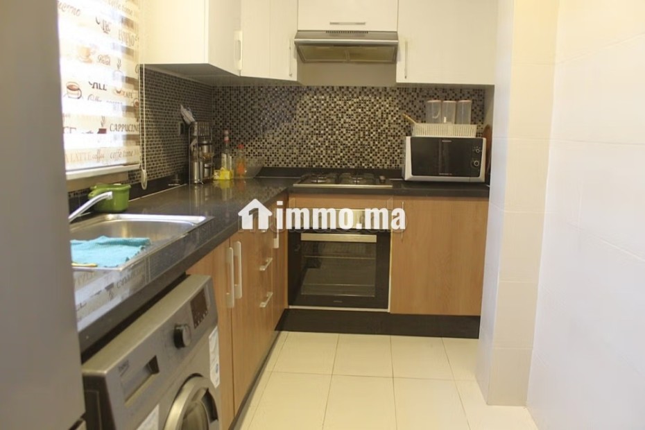 Appartement de deux chambres avec jardin privatif - Location Immobilier - Marrakech - photo 8