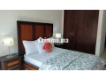 location-dun-appartement-a-saidia-surface-de-85-m2-salon-contemporain-small-0