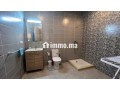 location-dun-appartement-a-saidia-surface-de-85-m2-salon-contemporain-small-2