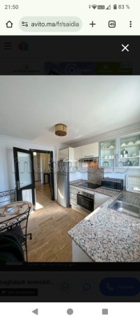 location-dun-appartement-a-saidia-surface-de-85-m2-salon-contemporain-big-4