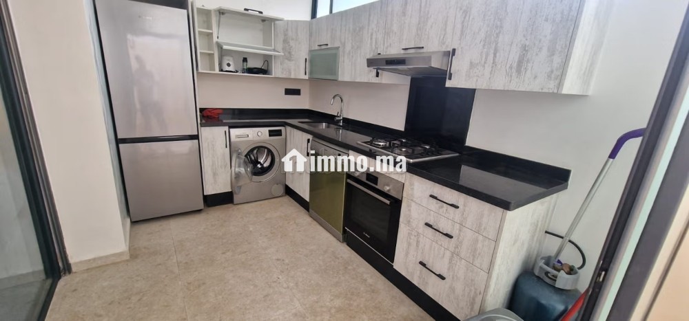 Appartements à louer à Agdal. Surface de 70 m². Prestation de conciergerie, air conditionné - Vente Immobilier - Rabat - photo 6
