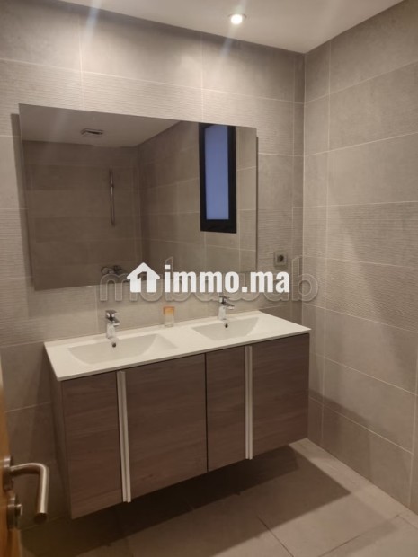 Appartements à louer à Agdal. Surface de 70 m². Prestation de conciergerie, air conditionné - Vente Immobilier - Rabat - photo 7