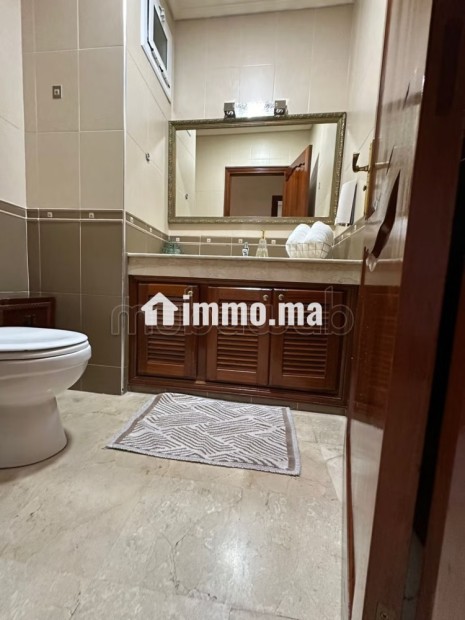 Superbe appartement à vendre à Kébibat. 2 belles chambres. Résidence avec concierge, climatisation générale - Vente Immobilier - Rabat - photo 5