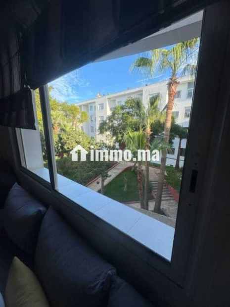 Appartement dans une résidence avec jardin a Riad - Location Immobilier - Rabat - photo 2