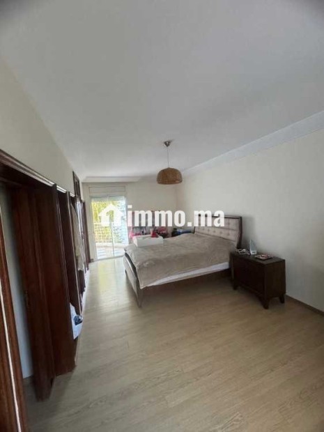 Appartement dans une résidence avec jardin a Riad - Location Immobilier - Rabat - photo 4
