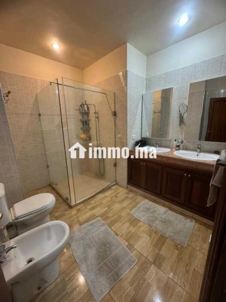 Appartement dans une résidence avec jardin a Riad - Location Immobilier - Rabat - photo 6