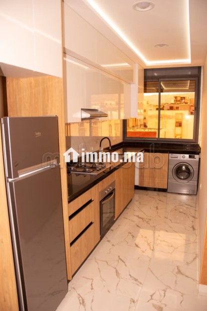 Appartement de vacances à louer à Hay Mohammadi. 1 Pièce. Salon typique marocain, résidence sécurisée - Vente Immobilier - Agadir - photo 4