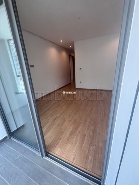 Très bel appartement en location à Souissi. 2 chambres. Ascenseur et stationnement - Location Immobilier - Rabat - photo 4
