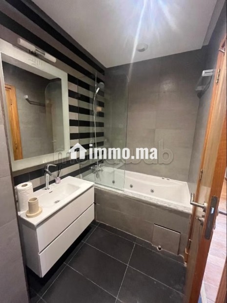 Appartement meuble a la marina - Location Immobilier - Casablanca - photo 7