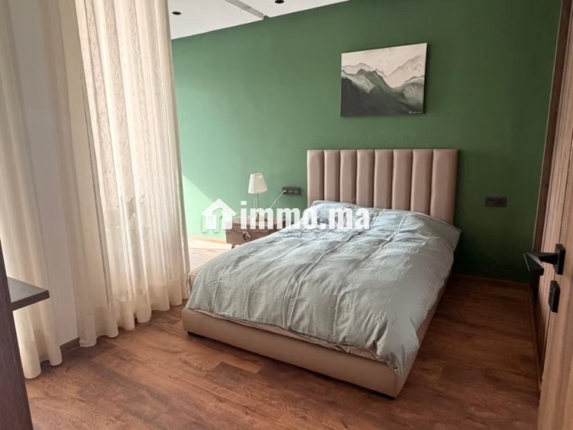 Louez cet appartement à Palmier. Superficie 54 m². Porte sécurisée et chauffage central - Location Immobilier - Casablanca - photo 5