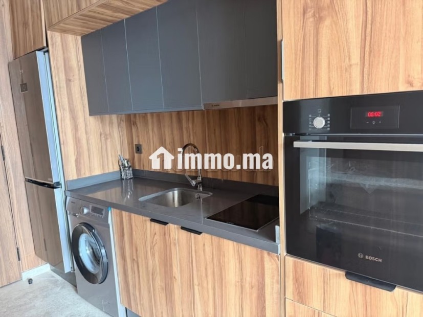Louez cet appartement à Palmier. Superficie 54 m². Porte sécurisée et chauffage central - Location Immobilier - Casablanca - photo 6