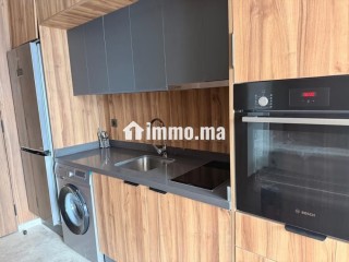 Louez cet appartement à Palmier. Superficie 54 m². Porte sécurisée et chauffage central - Appartement à louer - Casablanca