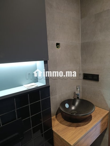 Superbe appartement à louer à Palmier. Surface de 48 m². Prestation de conciergerie, air conditionné - Location Immobilier - Casablanca - photo 7