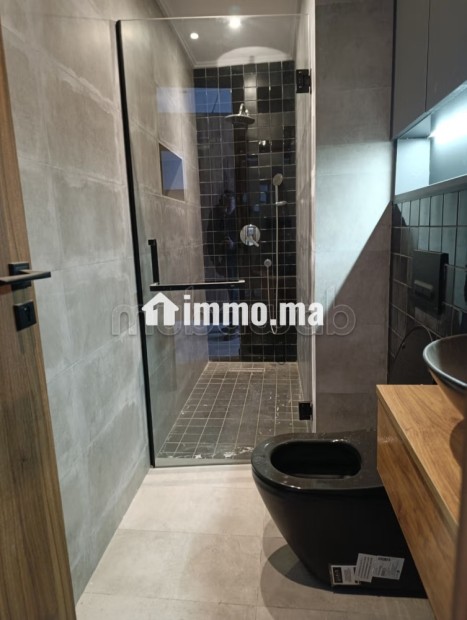 Superbe appartement à louer à Palmier. Surface de 48 m². Prestation de conciergerie, air conditionné - Location Immobilier - Casablanca - photo 8