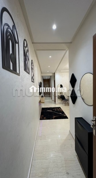 Location d'un appartement à Aïn Sebaâ. 3 pièces confortables. Ascenseur et stationnement - Vente Immobilier - Casablanca - photo 2