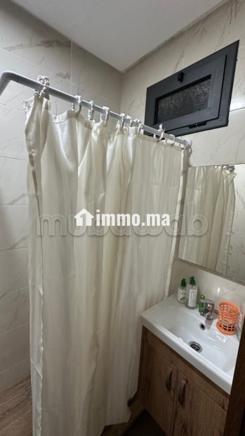 Location d'un appartement à Aïn Sebaâ. 3 pièces confortables. Ascenseur et stationnement - Vente Immobilier - Casablanca - photo 7