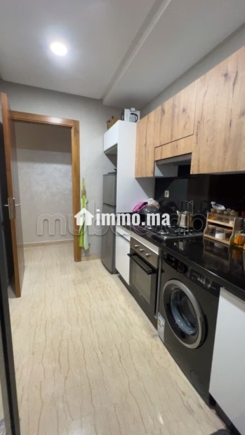 Location d'un appartement à Aïn Sebaâ. 3 pièces confortables. Ascenseur et stationnement - Vente Immobilier - Casablanca - photo 8