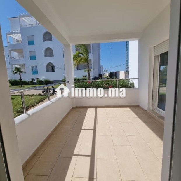 Superbe appartement à vendre à Asilah. 2 belles chambres. Garage et terrasse - Vente Immobilier - Asilah - photo 1