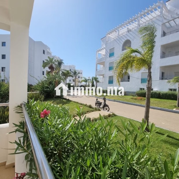 Superbe appartement à vendre à Asilah. 2 belles chambres. Garage et terrasse - Vente Immobilier - Asilah - photo 2