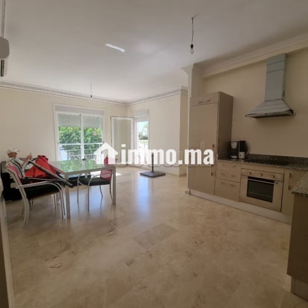 Superbe appartement à vendre à Asilah. 2 belles chambres. Garage et terrasse - Vente Immobilier - Asilah - photo 3